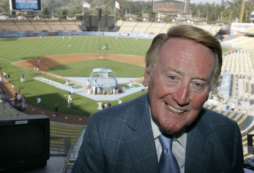 For 66 years, Dodgers announcer Vin Scully has provided the soundtrack for many of baseball's iconic moments. (AP/Mark J. Terrill)