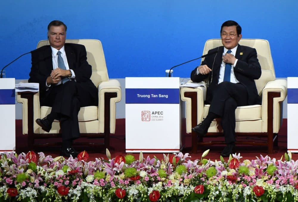 Vietnam's President Truong Tan Sang (R) speaks as Greg Boyce (L), chairman and CEO of Peabody Energy, looks on as they attend a dialogue at the APEC CEO Summit at the China National Convention Centre (CNCC) in Beijing on November 10, 2014, part of the Asia-Pacific Economic Cooperation (APEC) Summit.  APEC Economic Leaders' Meetings and APEC summit is being held at Beijing's outskirt Yanqi Lake.   (Wang Zhao/Getty Imgaes)