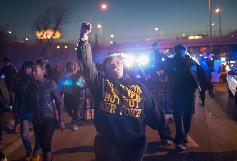 Demonstrators protesting the shooting death of 16-year-old Pierre Loury block traffic on the Eisenhower Expressway during a march on April 12, 2016 in Chicago, Illinois. (Scott Olson/Getty)