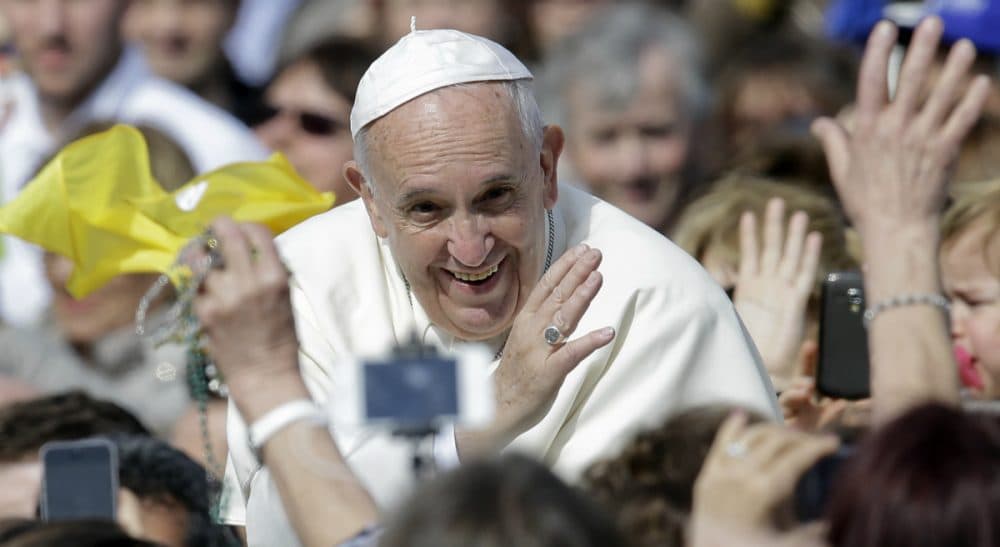 Pope Francis smiles as he blesses faithful as he arrives in St. Peter's Square to attend a jubilee audience at the Vatican, Saturday, April 9, 2016.  Francis has insisted that individual conscience be the guiding principle for Catholics negotiating the complexities of sex, marriage and family life in a major document released last week that repudiates the centrality of black and white rules for the faithful. In the 256-page document, Amoris Laetitia (The Joy of Love), the pope makes no change in church doctrine. (Gregorio Borgia/AP)
