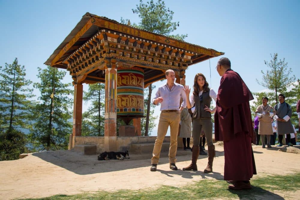 Prince William, Duke of Cambridge and Catherine, Duchess of Cambridge, chat to a monk on the trek up to Tiger's Nest during a visit to Bhutan on the April 15, 2016 in Thimphu, Bhutan. The royal couple are visiting Bhutan as part of a week-long visit to India and Bhutan that has taken in cities such as Mumbai, Delhi, Kaziranga, Bhutan and Agra.  (Dominic Lipinski/Getty Images)
