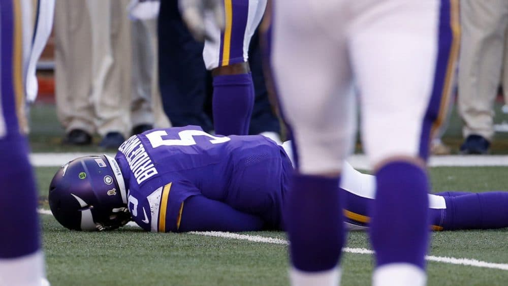 Minnesota Vikings quarterback Teddy Bridgewater lies on the field after suffering a concussion. On Monday, a three-judge panel  (AP Photo/Ann Heisenfelt, File)