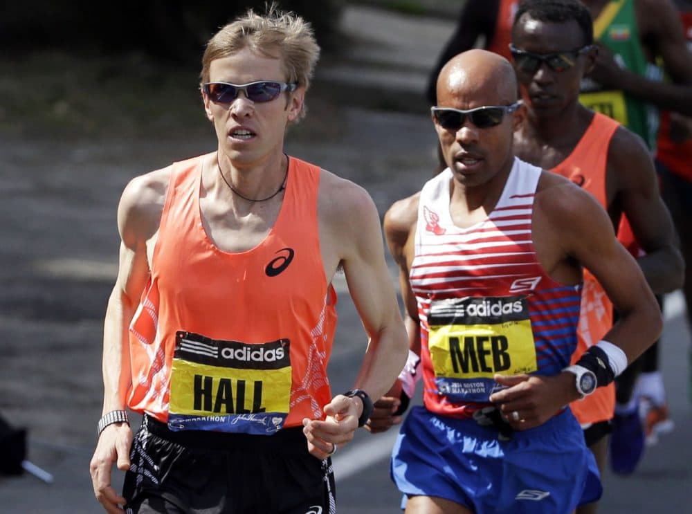 Ryan Hall, left, of Redding, California, runs near Meb Keflezighi, of San Diego, in the 2014 Boston Marathon. Keflezighi came in first place that year and it turned out to be Hall's final Boston appearance. (Steven Senne/AP)