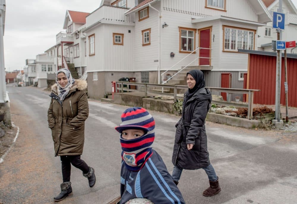 Refugees walk on the streets on February 10, 2016 in Kladesholmen, Sweden. Last year Sweden received 162,877 asylum applications, more than any European country proportionate to its population. According to the Swedish Migration Agency, Sweden housed more than 180,000 people in 2015, more than double the total in 2014. The country is struggling to house refugees in proper conditions during the harsh winter; summer holiday resorts, old schools and private buildings are being turned into temporary shelters for asylum seekers as they wait for a decision on their asylum application. Sweden is facing new challenges on its migration policy after the massive arrival of refugees last year, forcing the country to drastically reduce the number of refugees passing through its borders. Stricter controls have had a significant effect on the number of arrivals, reducing weekly numbers from 10,000 to 800. The Swedish migration minister announced in January that the government will reject up to 80,000 refugees who applied for asylum last year, proposing strict new residency rules.  (David Ramos/Getty Images)