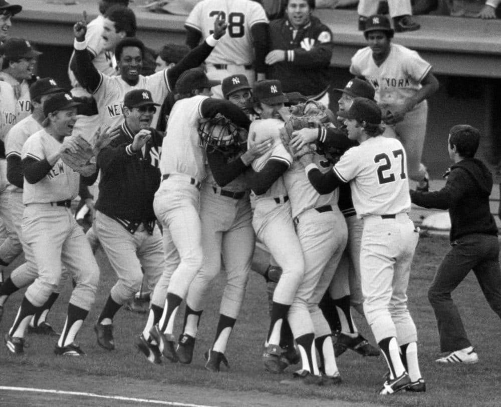 The New York Yankees celebrate after winning the one-game playoff against the Boston Red Sox at Fenway Park, Oct. 2, 1978, sending the Yankees to the post season. Closer Goose Gossage popped up Carl Yastrzemski with two Red Sox on base in the bottom of the ninth, sending the Fenway faithful home stunned. The American League Championship Series started in Kansas City the following day.
(AP Photo)