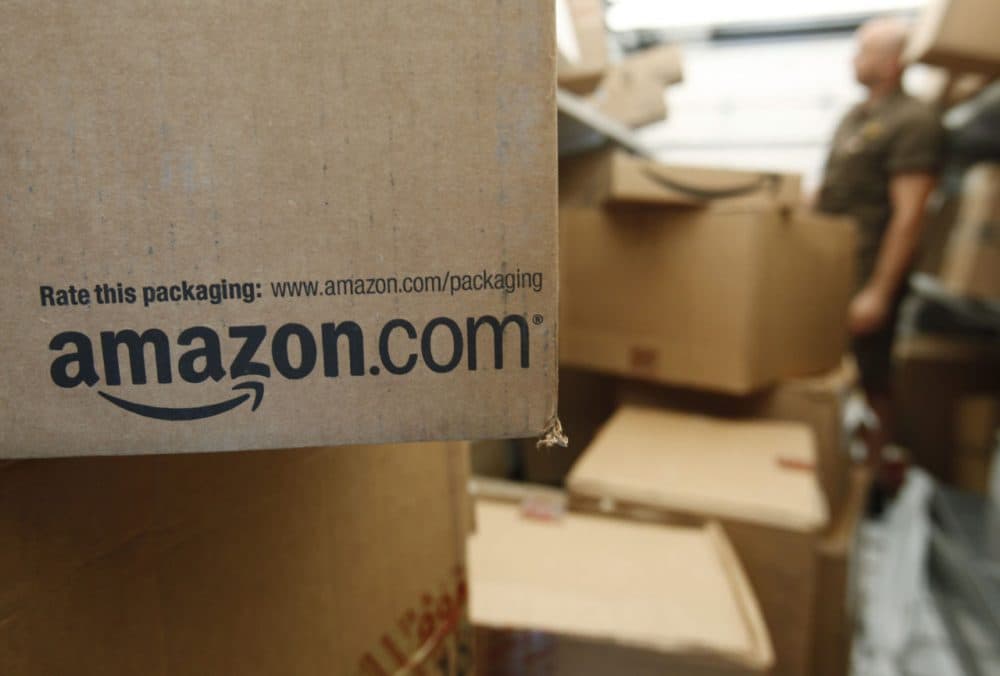 After criticism of its gap in same-day delivery in Roxbury, Amazon announced it will now offer the service to all Boston ZIP codes. (Paul Sakuma/AP)