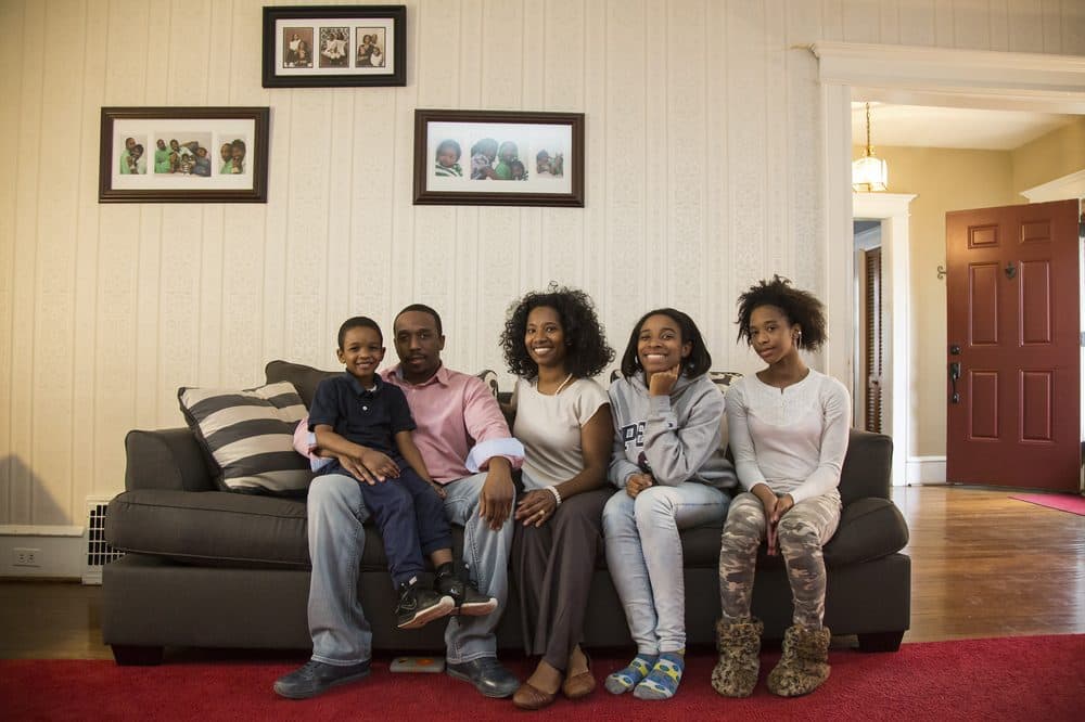 The Miller family sits in the living room of their home in a Philadelphia suburb. They are part of an ongoing lawsuit, arguing Pennsylvania has neglected its constitutional responsibility to provide all children a &quot;thorough and efficient&quot; education. (Emily Cohen for NPR)