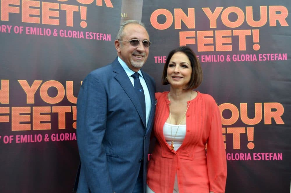 In this Sept. 21, 2014 photo, Emilio Estefan, left, and Gloria Estefan pose for photos at the Adrienne Arsht Center for the Performing Arts in Miami during the casting for Broadway musical On Your Feet! (Ivan Cruz/AP)