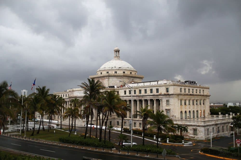The Puerto Rican Capitol building is seen as the island's residents deal with the government's $72 billion debt on July 1, 2015 in San Juan, Puerto Rico. (Joe Raedle/Getty Images)