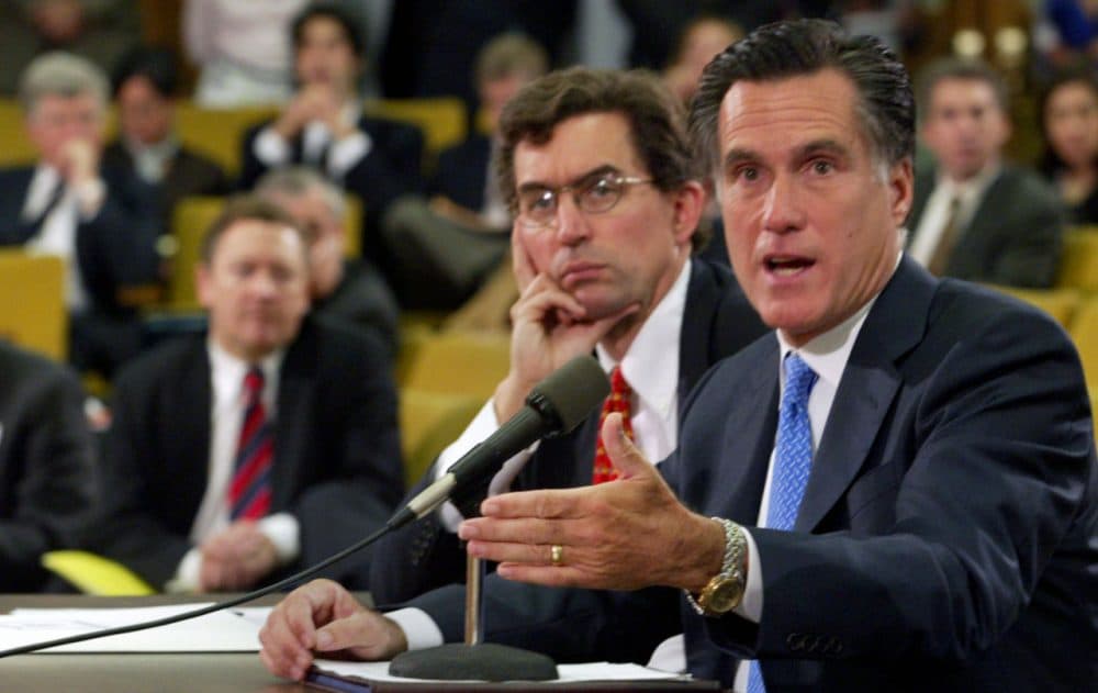 Former Mass. Governor Mitt Romney testifying at the State House in 2005, on his vision of privately provided health insurance for all residents(Bizuayehu Tesfaye/AP)