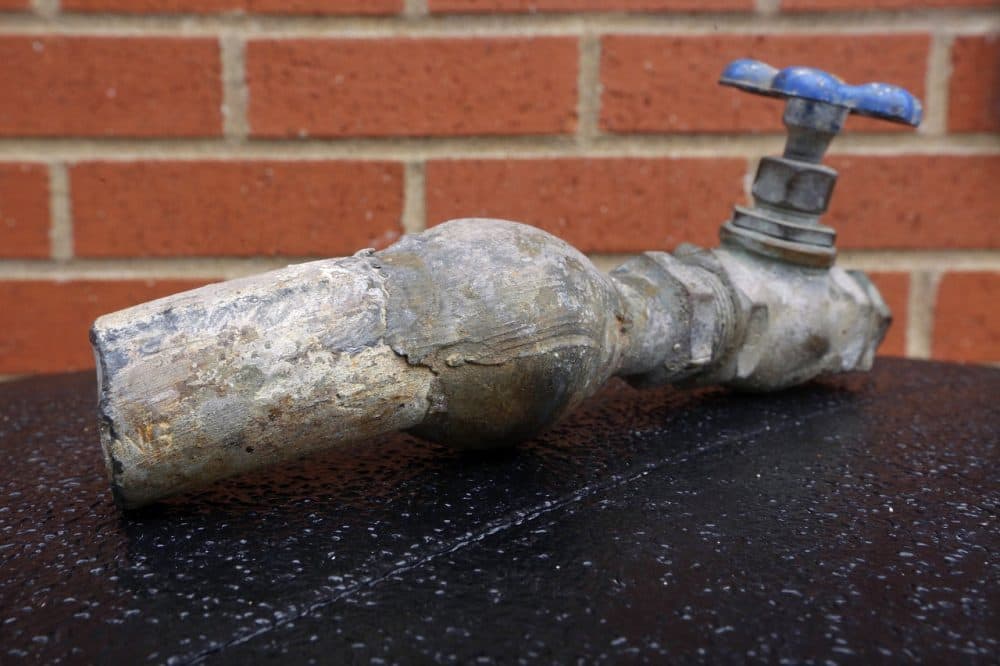 Old pipes, like these from Galesburg, Ill. have lead to tainted water in Mass. (Seth Perlman/AP)