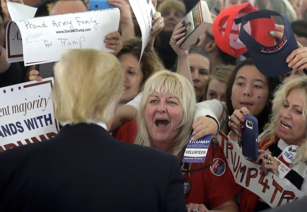 Republican presidential candidate Donald Trump greets people in the crowd after speaking at a campaign rally Monday in Warwick, R.I. (Steven Senne/AP)