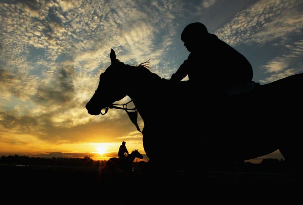 While some aspiring sportswriters strive to cover the world's biggest events, Bill finds inspiration in the less-celebrated things, like a sunrise at Saratoga Race Course. (Al Bello/Getty Images)