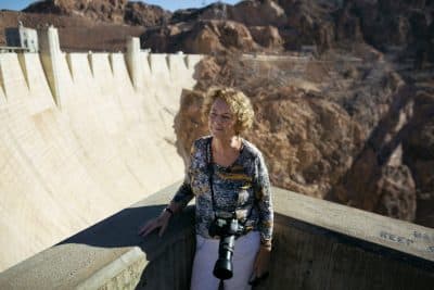 Geri Taylor, camera in tow, at the Hoover Dam in 2014. Photography had been a sideline for 30 years, but now she could really devote time to it.
Courtesy, New York Times. MICHAEL KIRBY SMITH FOR THE NEW YORK TIMES.