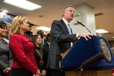 New York City Mayor Bill de Blasio announces his plan to raise the minimum wage for all city workers to $15 per hour on January 6, 2016 in New York City. The plan will effect approximately 50,000 city workers and will be fully phased in by 2018.  (Andrew Burton/Getty Images)