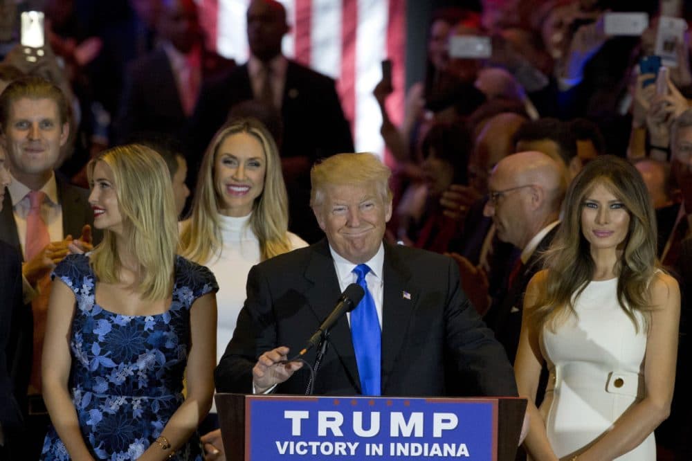 Republican presidential candidate Donald Trump is joined by his wife Melania and daughter Ivanka as he arrives for a primary night news conference Tuesday. (Mary Altaffer/AP)