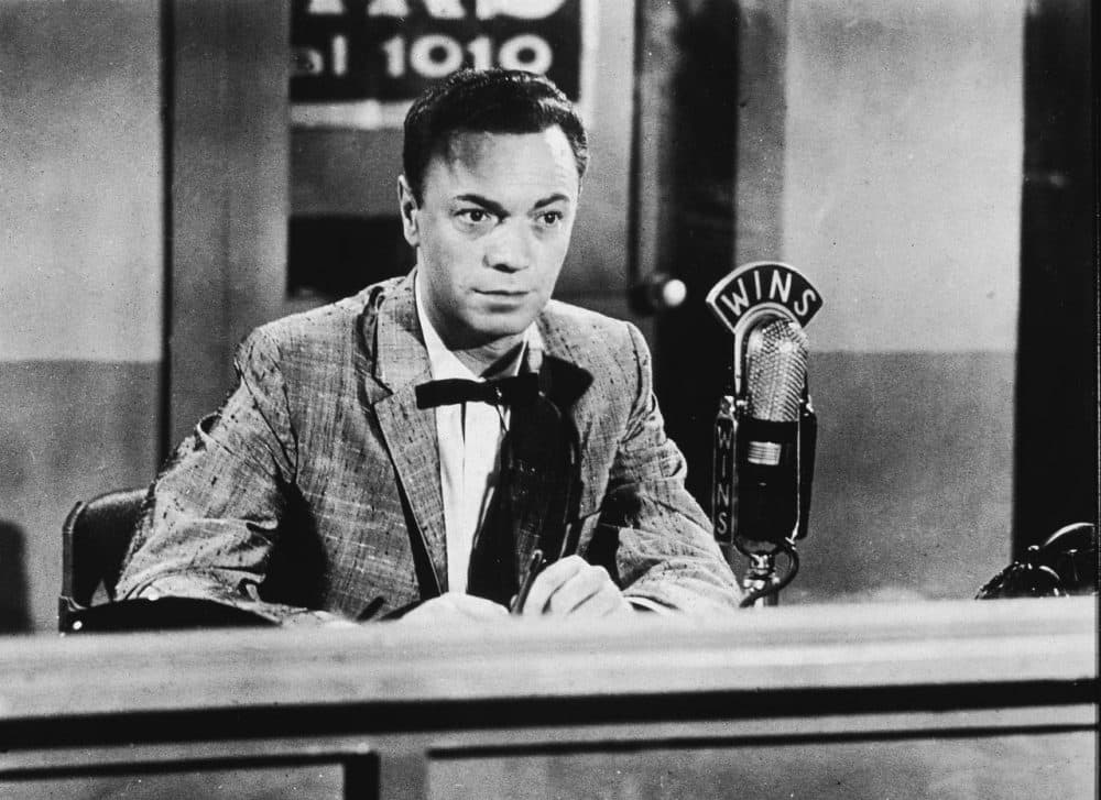 American disc jockey and radio performer Alan Freed (1921 - 1965) who coined the term rock 'n' roll sits in a 1010 WINS sound studio during a radio broadcast, 1950s. (Hulton Archive/Getty Images)