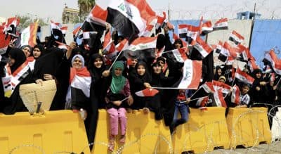On April 26, 2016, thousands of Muqtada al-Sadr's supporters gathered in front of the Green Zone in Baghdad, Iraq. (Karim Kadim/AP Photo)