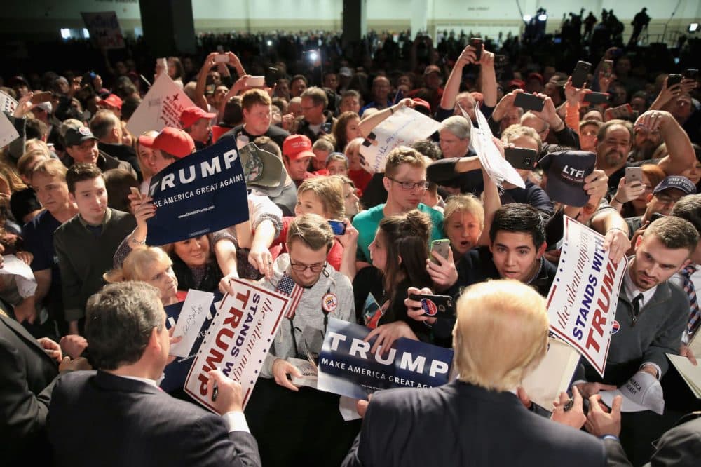 Republican presidential candidate Donald Trump and New Jersey Governor Chris Christie sign autographs for fans at a rally at the Fort Worth Convention Center on February 26, 2016 in Fort Worth, Texas. (Tom Pennington/Getty Images)