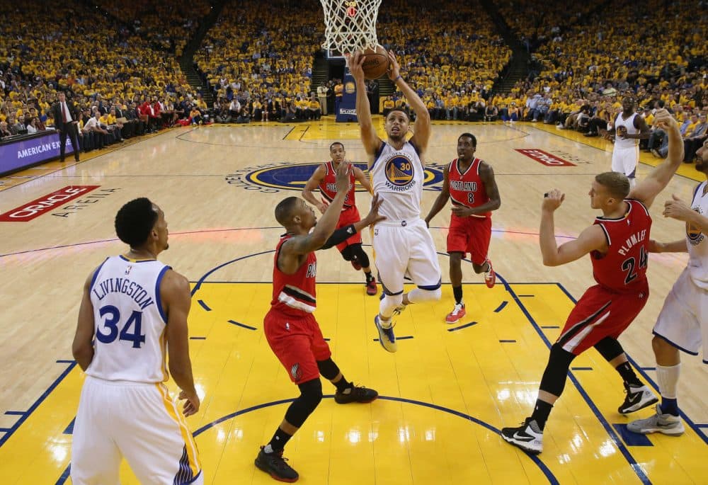 Stephen Curry #30 of the Golden State Warriors goes up for a shot against the Portland Trail Blazers during Game Five of the Western Conference Semifinals during the 2016 NBA Playoffs on May 11, 2016 at Oracle Arena in Oakland, California. (Ezra Shaw/Getty Images)