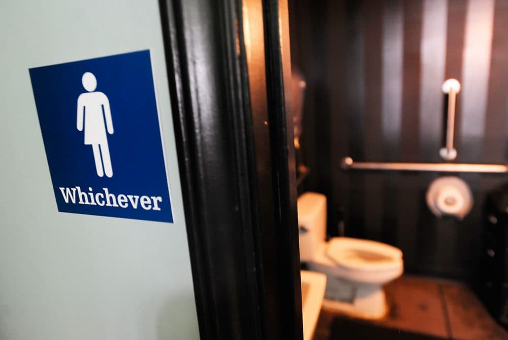 A gender neutral sign is posted outside a bathrooms at Oval Park Grill on May 11, 2016 in Durham, North Carolina. Debate over transgender bathroom access spreads nationwide as the U.S. Department of Justice countersues North Carolina Governor Pat McCrory from enforcing the provisions of House Bill 2 (HB2) that dictate what bathrooms transgender individuals can use.  (Sara D. Davis/Getty Images)