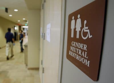 A sign marks the entrance to a gender-neutral restroom at the University of Vermont in Burlington. The Obama administration Friday offered guidance to schools across the country about what they could do to protect civil rights of students. (Toby Talbot/AP File)
