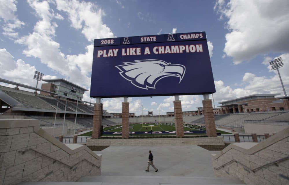 FILE -In this Aug. 28, 2012 file photo, the scoreboard is shown at Eagle Stadium at Allen High School in Allen, Texas. This suburban Dallas school district grabbed national attention in 2012 when it opened an eye-popping $60 million high school football stadium. Are such exorbitant price tags for high school stadiums the new normal? Only in Texas, it seems.  (AP Photo/LM Otero, File)