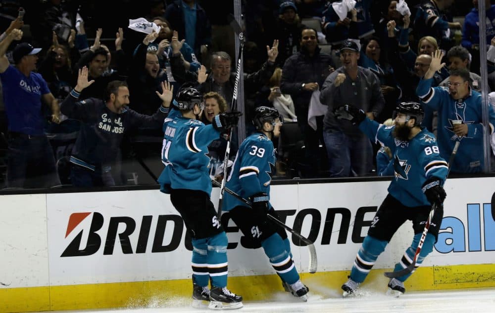 SAN JOSE, CA - MAY 12:  Logan Couture #39 of the San Jose Sharks is congratulated by Brent Burns #88 and Joonas Donskoi #27 after Couture scored in the second period against the Nashville Predators  in Game Seven of the Western Conference Second Round during the 2016 NHL Stanley Cup Playoffs at SAP Center on May 12, 2016 in San Jose, California.  (Photo by Ezra Shaw/Getty Images)