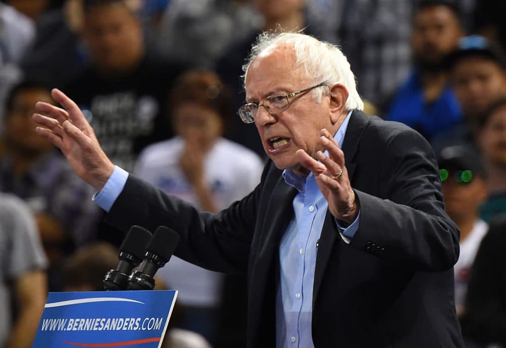Democratic presidential candidate Bernie Sanders addresses a primary night election rally in Carson, California, May 17, 2016.  
Sanders scored a decisive victory over Hillary Clinton in the Democratic primary in Oregon, boosting his argument for keeping his underdog campaign alive through the conclusion of the primary process.  Several US networks called the Pacific northwest state for the liberal Sanders, who was leading the former secretary of state 53 percent to 47 percent. Earlier in the night, Clinton claimed victory in an extraordinarily tight race in the state of Kentucky. (ROBYN BECK/AFP/Getty Images)