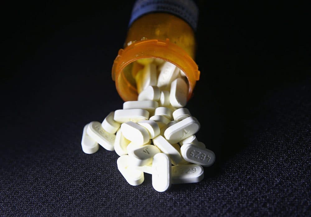 Oxycodone pain pills prescribed for a patient with chronic pain lie on display on March 23, 2016 in Norwich, CT. Communities nationwide are struggling with the unprecidented opioid pain pill and heroin addiction epidemic. On March 15, the U.S. Centers for Disease Control (CDC), announced guidelines for doctors to reduce the amount of opioid painkillers prescribed, in an effort to curb the epidemic. The CDC estimates that most new heroin addicts first became hooked on prescription pain medication before graduating to heroin, which is stronger and cheaper.  (John Moore/Getty Images)