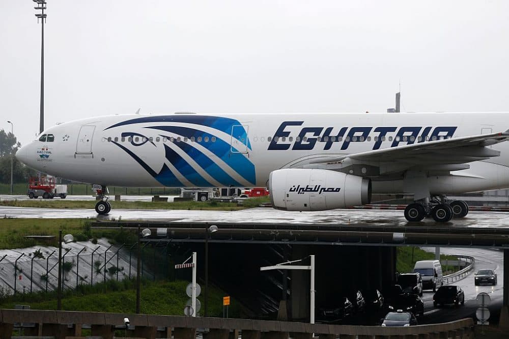 This picture taken on May 19, 2016, shows an Egyptair Airbus A330 from Cairo taxiing at the Roissy-Charles De Gaulle airport near Paris after its landing a few hours after the MS804 Egyptair flight crashed into the Mediterranean. 
An EgyptAir flight from Paris to Cairo crashed into the Mediterranean on May 19, 2016, with 66 people on board, prompting an investigation into whether it was mechanical failure or a bomb. There were no immediate reports of the discovery of any debris in the area of sea between the Greek islands and the Egyptian coast where the plane vanished from radar screens. / AFP / THOMAS SAMSON        (Photo credit should read THOMAS SAMSON/AFP/Getty Images)
