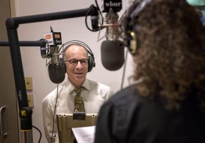 Co-hosts Dr. Eddie Phillips and CommonHealth's Carey Goldberg record The Magic Pill in a WBUR studio. Photo: Robin Lubbock)