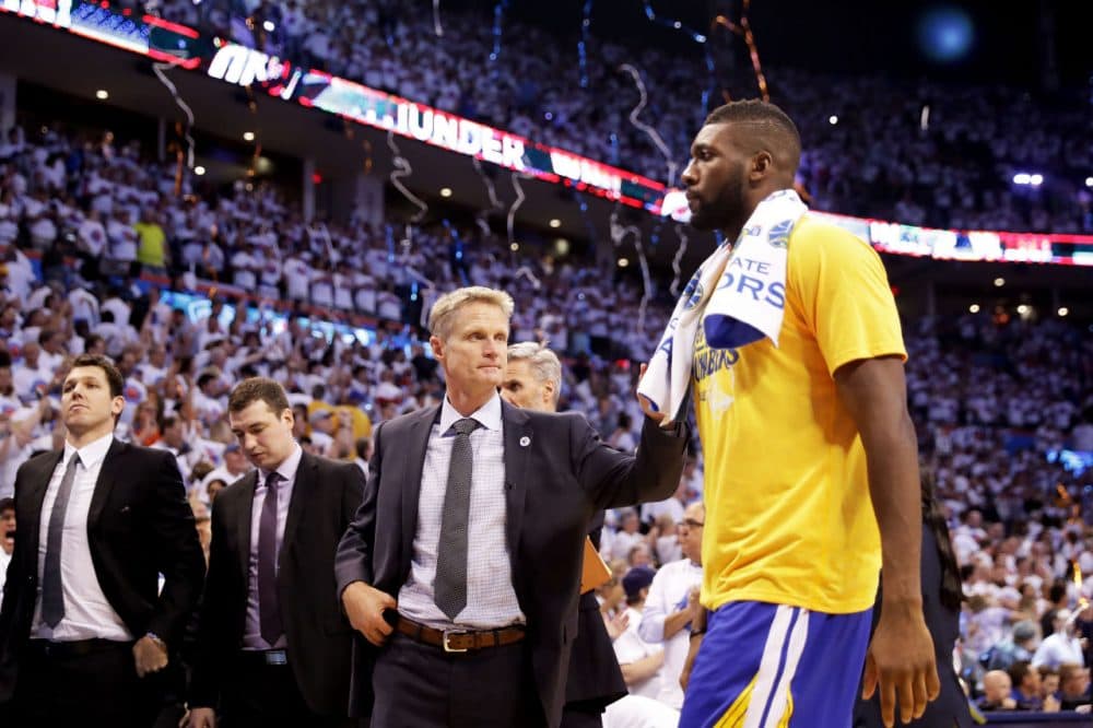 Festus Ezeli and head coach Steve Kerr of the Golden State Warriors walk off of the court after their 94 to 118 loss to the Oklahoma City Thunder in game four of the Western Conference Finals during the 2016 NBA Playoffs at Chesapeake Energy Arena on May 24, 2016 in Oklahoma City, Oklahoma. (Ronald Martinez/Getty Images)
