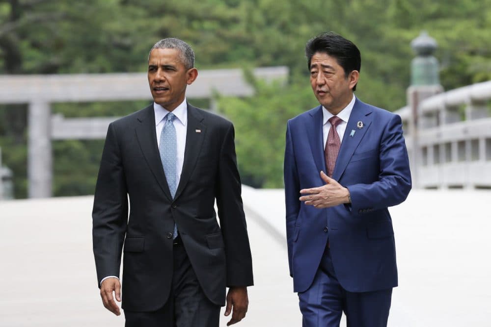 U.S. President Barack Obama walks with Japanese Prime Minister Shinzo Abe on the Ujibashi bridge as they visit at the Ise-Jingu Shrine on May 26, 2016 in Ise, Japan. In the two-day summit, the G7 leaders are scheduled to discuss the pressing global issues including counter-terrorism, energy policy, and sustainable development. (Chung Sung-Jun/Getty Images)