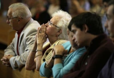 Parishioners gathered for a final service at St. Frances X. Cabrini Church on Sunday, May 29 in Scituate. After nearly 12 years of 24/7 vigils, parishioners say it's time to abandon the fight to keep the building open and instead form a new church. (Steven Senne/AP)
