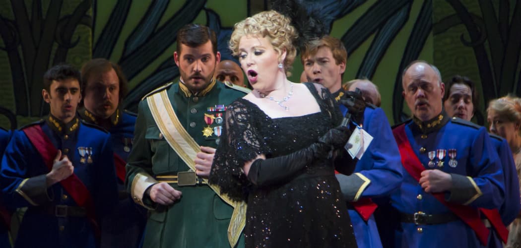 Erin Wall, as Hanna Glawari, surrounded by the ensemble of Boston Lyric Opera’s production of &quot;The Merry Widow.&quot; (Courtesy of T Charles Erickson/BLO)
