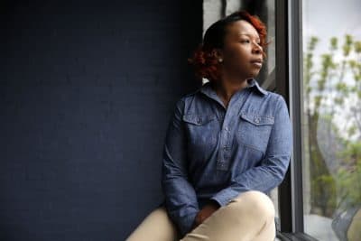 In this April 27, 2016, photo, Lezley McSpadden poses for a portrait in St. Louis. McSpadden was sitting in her car on a smoke break from her grocery store job on Aug. 9, 2014, when a friend told her someone had been shot near Canfield Apartments in Ferguson, Mo. After that her life crumbled learning her son, 18-year-old son Michael Brown, had been shot and killed by a police officer. McSpadden recounts what happened that fateful day two summers ago in her autobiography, &quot;Tell the Truth &amp; Shame the Devil,&quot; set to be released Tuesday, May 10, 2016, and co-written by Lyah Beth LeFlore. (AP Photo/Jeff Roberson)