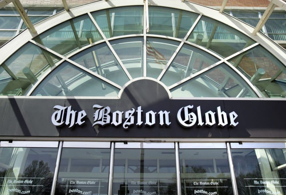 The facade of The Boston Globe building in Dorchester. The paper's editor recently made announcements about upcoming buyouts and a 'reinvention initiative.' (AP Photo/Elise Amendola)