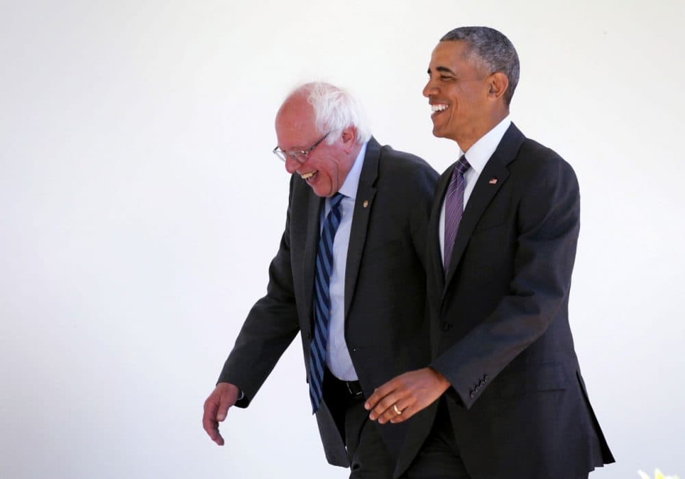 Democratic presidential candidate Sen. Bernie Sanders (D-VT) (L) walks with President Barack Obama (R) through the Colonnade as he arrives at the White House for an Oval Office meeting June 9, 2016 in Washington, DC. Sanders met with President Obama after Hillary Clinton has clinched the Democratic nomination for president. (Alex Wong/Getty Images)