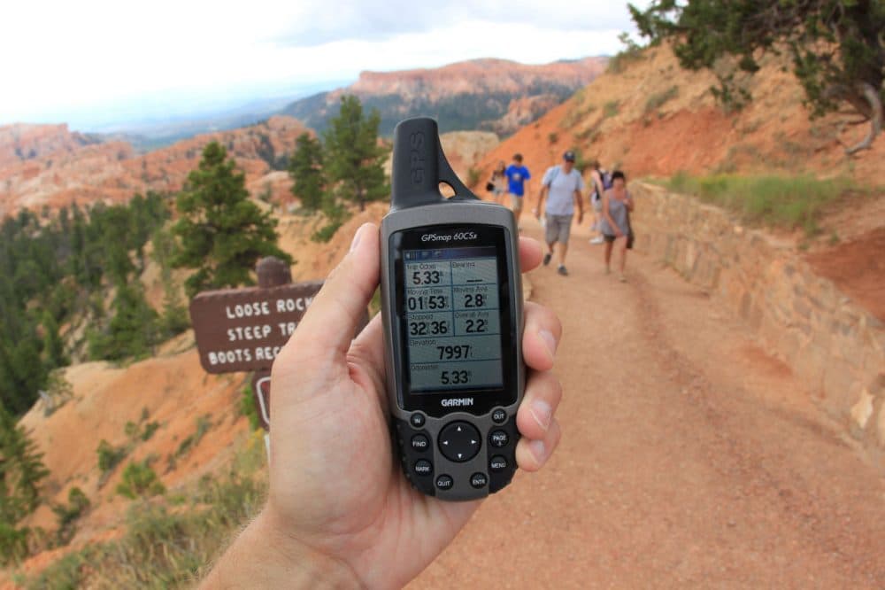 GPS and emergency beacons are becoming more popular on the trail.  But experienced hikers say people on long hikes should know how to read a map and use a compass in case the location technology they’ve brought along fails. (daveynin/Flickr)
