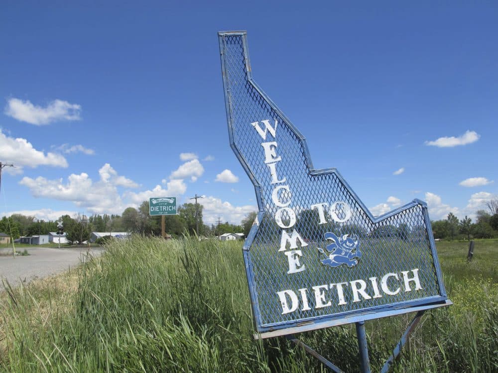 A sign welcomes residents and visitors to the tiny town in Dietrich, Idaho on Thursday, May 26, 2016. The small community is struggling with the national attention brought by reports that a disabled black football player was raped by his white high school teammates. (Kimberlee Kruesi/AP)