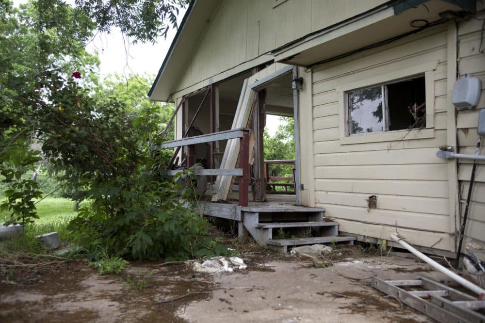 Many in the town of Martindale have been waiting on home repairs after flooding last year, but, after serveral severe weather events in the area, volunteer groups say they're stretched thin. (Miguel Gutierrez Jr./KUT)