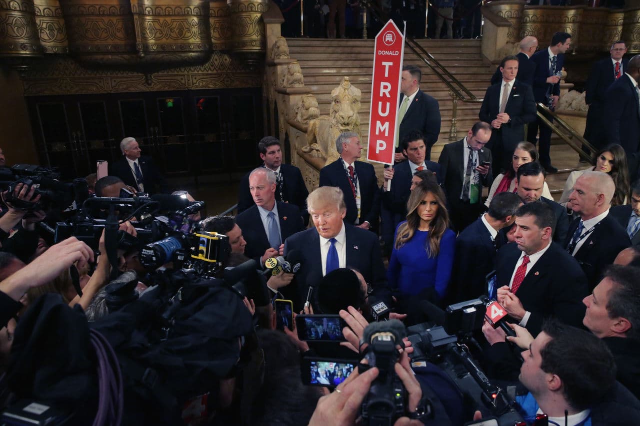 Republican presidential candidate Donald Trump greets reporters in the spin room following a debate sponsored by Fox News at the Fox Theatre on March 3, 2016 in Detroit, Michigan. (Chip Somodevilla/Getty Images)