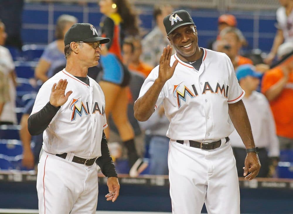 MIAMI, FL - MAY 11:  Manager Don Mattingly, left,  #8 of the Miami Marlins speaks with batting coach Barry Bonds as they wait to congratulate players after they defeated the Miami Marlins 3-2 at Marlins Park on May 11, 2016 in Miami, Florida.   (Photo by Joe Skipper/Getty Images)
