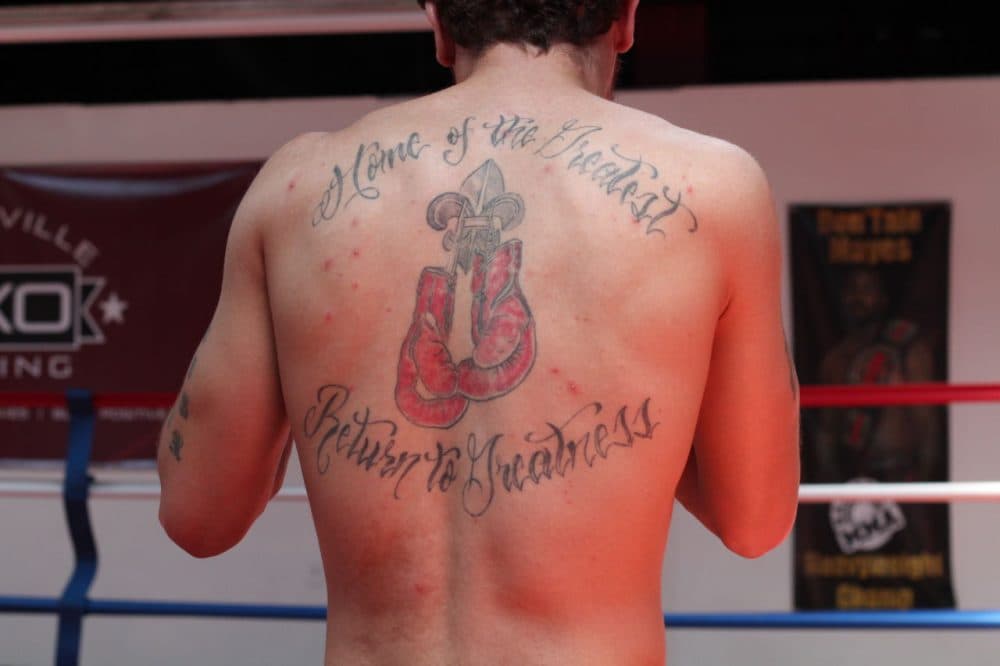Braxton Carter, a 30-year-old fighter at TKO Boxing, got this tattoo honoring Muhammad Ali about a year before Ali’s death. (Jacob Ryan/wfpl.org)