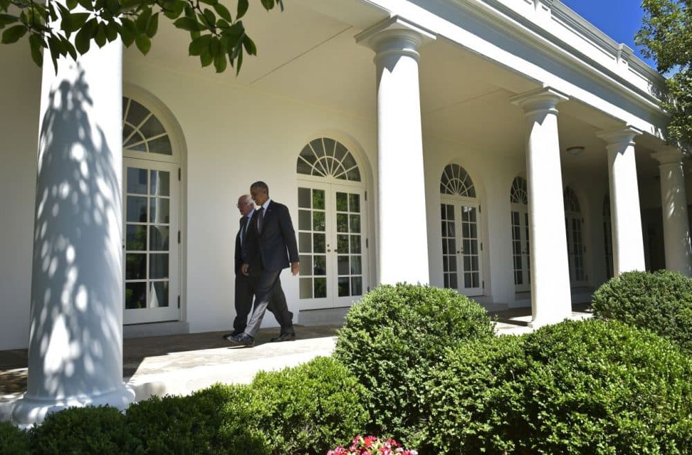 US President Barack Obama (R) walks with Democratic presidential candidate Bernie Sanders through the Colonnade for a meeting in the Oval Office on June 9, 2016 at the White House in Washington, DC. (MANDEL NGAN/AFP/Getty Images)