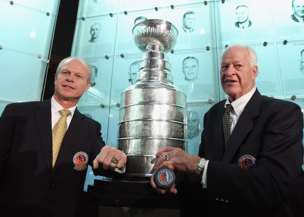 (L-R) 2011 Hall of Fame inductee Mark Howe poses along with his father Gordie Howe during a photo opportunity at the Hockey Hall Of Fame on November 14, 2011 in Toronto, Ontario, Canada. (Bruce Bennett/Getty Images)