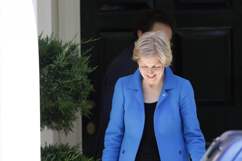 Sen. Elizabeth Warren departs the Washington home of Democratic presidential candidate Hillary Clinton on Friday. (Paul Holston/AP)