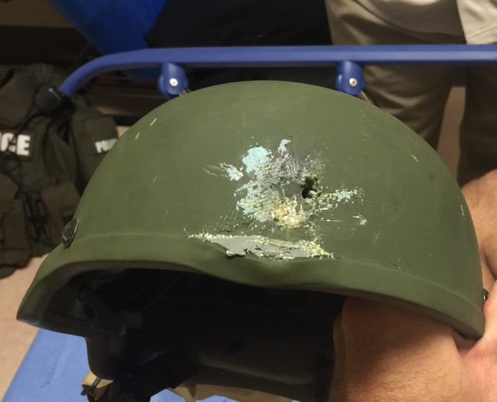 This image provided by the Orlando Police Department shows the helmet an officer in Orlando, Fla., was wearing when responding to the shooting at Pulse Nightclub. (Orlando Police Department via AP)