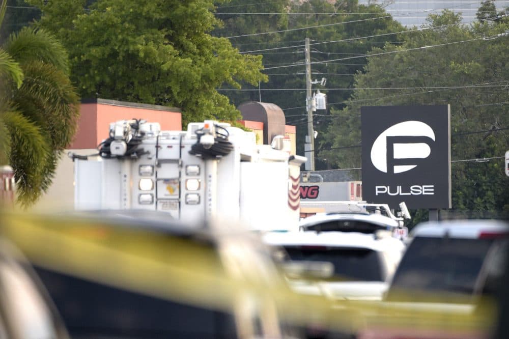 Police cars and emergency vehicles surround the Pulse Orlando nightclub on Sunday. (Phelan M. Ebenhack/AP)